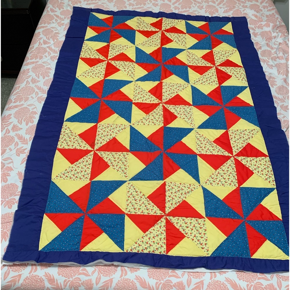 Quilt Muliticolor 62x44 unfinished trim  see photos for small stains